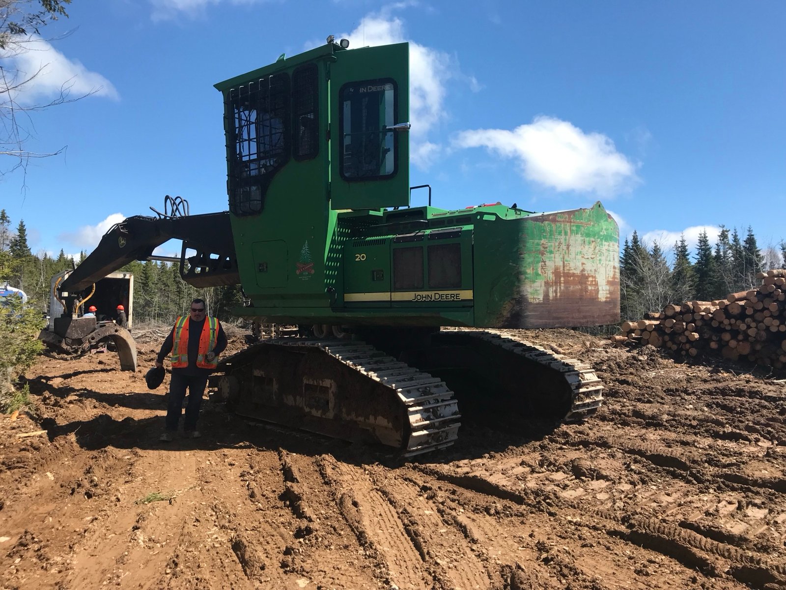 John Deere tracked forwarder on a clear-felled site